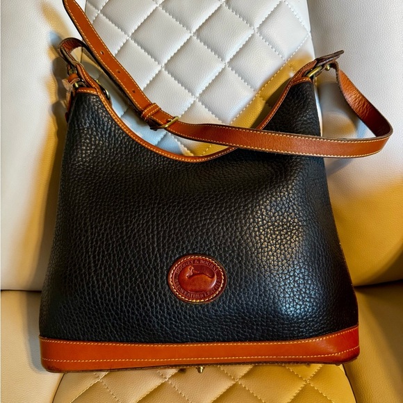 Dooney & Bourke Navy and Tan AWL Shoulder Bag - Picture 1 of 7